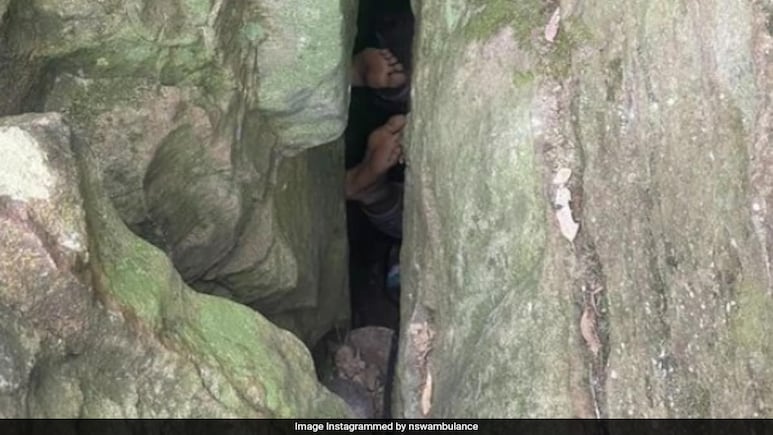 Woman Trapped Upside Down Between Rocks While Trying To Retrieve Phone