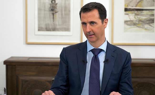 In First Statement, Bashar al Assad Denies 'Planned' Departure From Syria