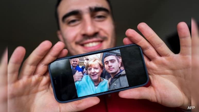 Syrian Whose Selfie With Merkel Went Viral Wants To Stay In Germany