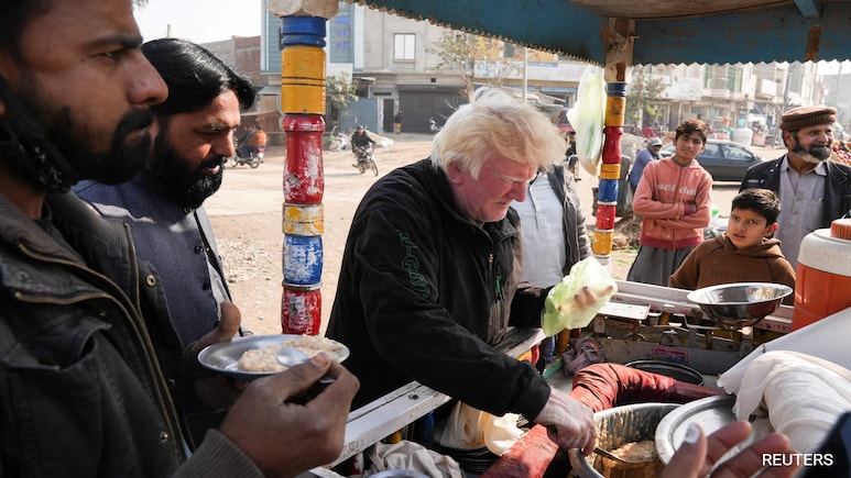 Donald Trump Look Alike Sings To Sell Pudding In Pakistan